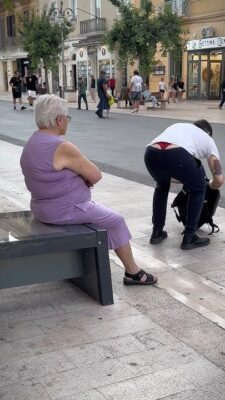 caption group man bending over