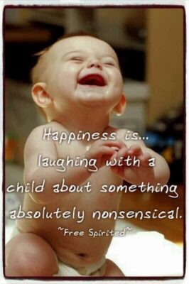 happiness group laughing wth baby